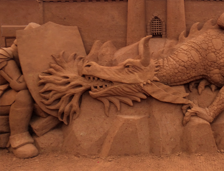 Image of a dragon sand sculpture - defining the problem is the first step in slaying your dragon Image link to Define the Problem.